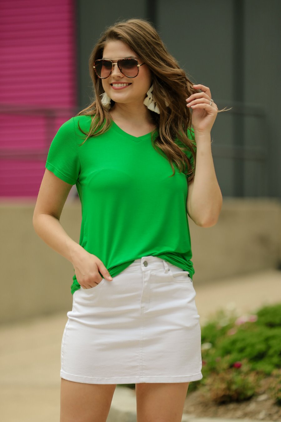 short-sleeved tee made of soft, breathable fabric with a V-neckline and a rounded hemline in kelly green