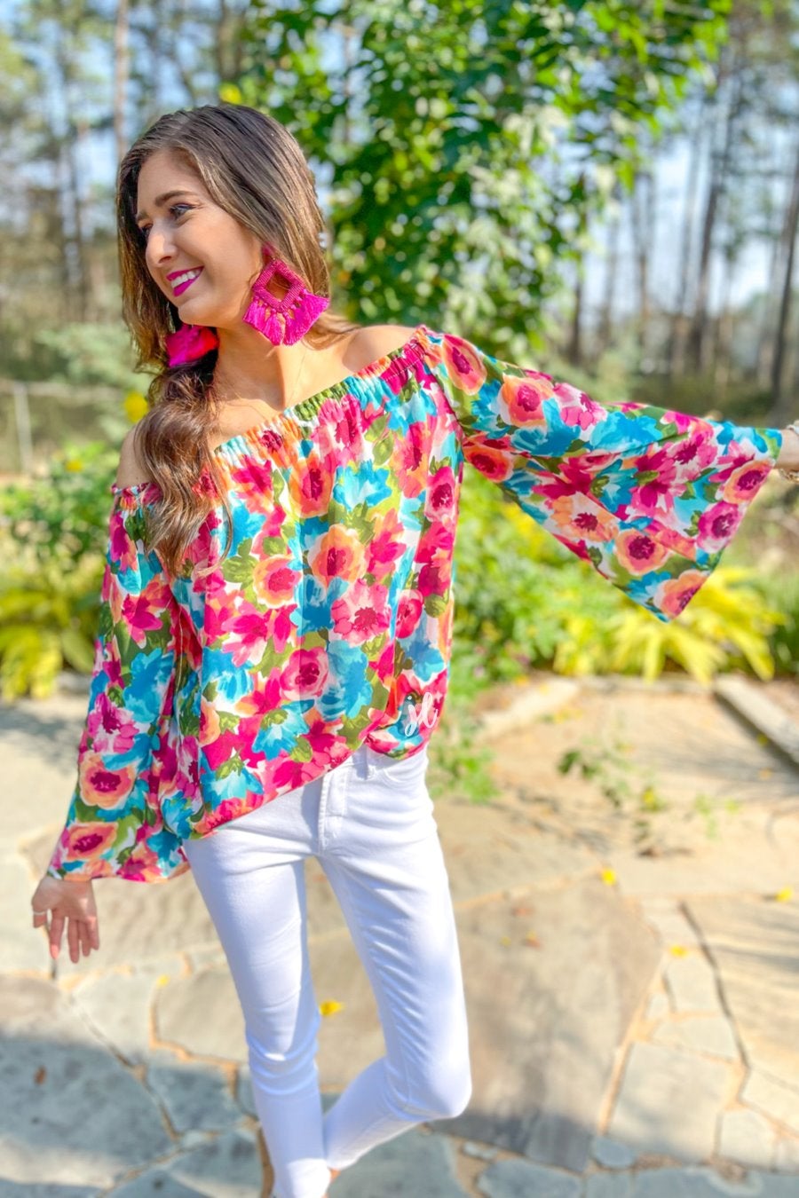 off-the-shoulder flow top with an elastic neckline in a vibrant exclusive floral pattern in multicolor