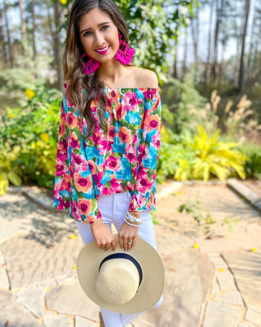 off-the-shoulder flow top with an elastic neckline in a vibrant exclusive floral pattern in multicolor