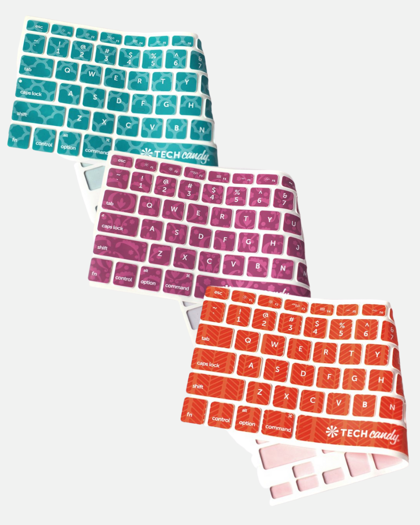 silicone keyboard cover available in barcelona (teal), bordeaux (magenta), and road trip (orange)