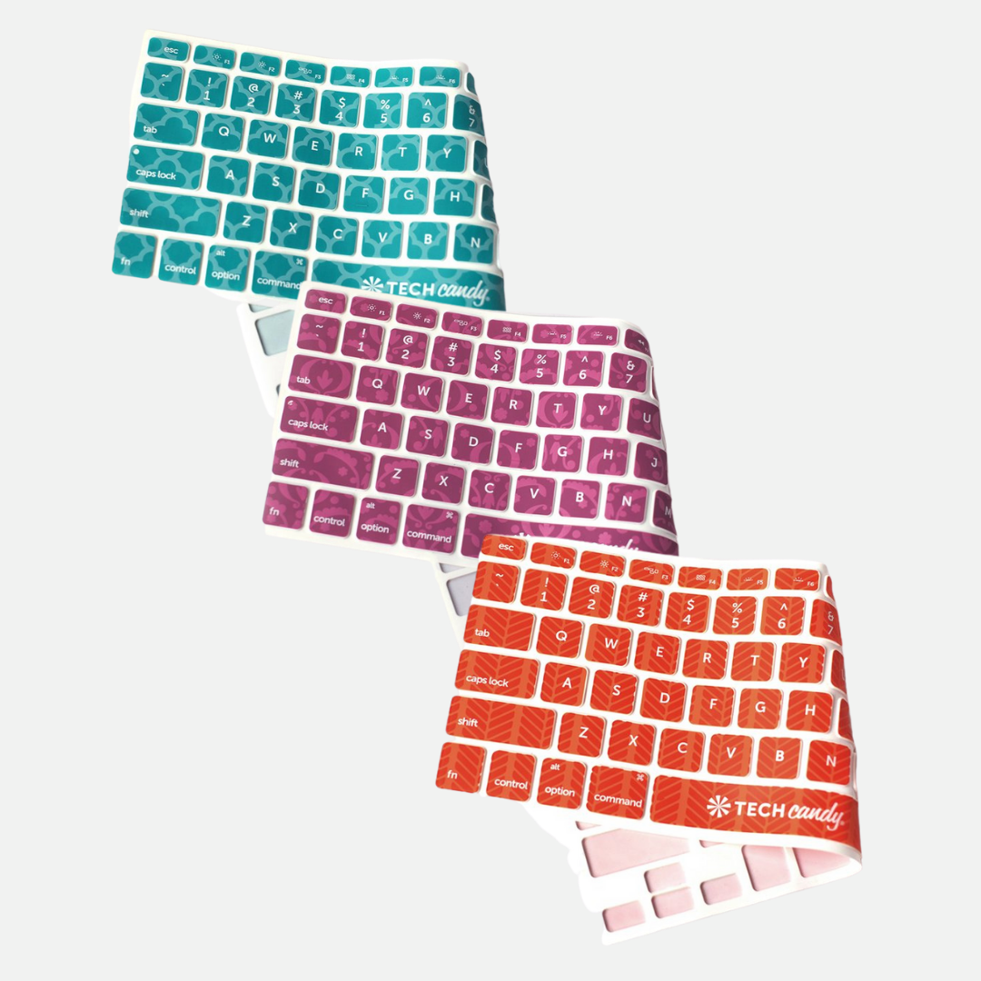 silicone keyboard cover available in barcelona (teal), bordeaux (magenta), and road trip (orange)