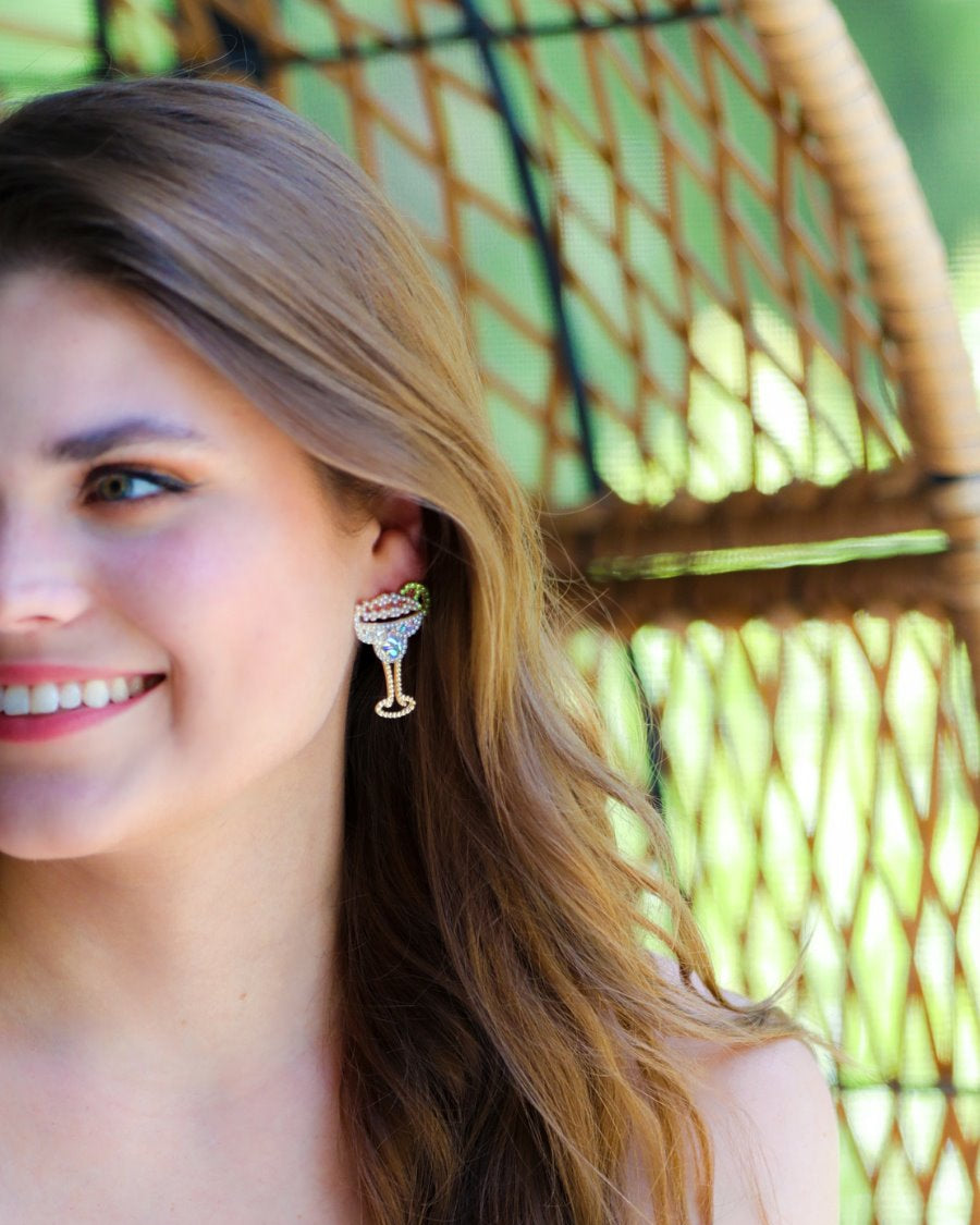 a margarita glass shape gold plated stud earring with eye-catching stone with a comfort back earring, and plastic disc stopper in gold