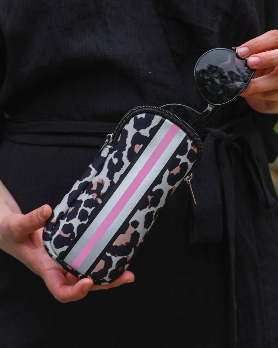 ultra-lightweight sunglasses case made of neoprene with a top double zipper in silver hardware and corresponding racing stripes in tan leopard