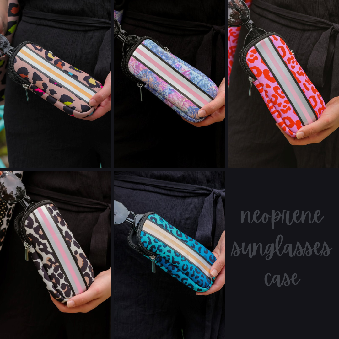 ultra-lightweight sunglasses case made of neoprene with a top double zipper in silver hardware and corresponding racing stripes in multi leopard, multi snake, pink leopard, tan leopard, and turquoise leopard