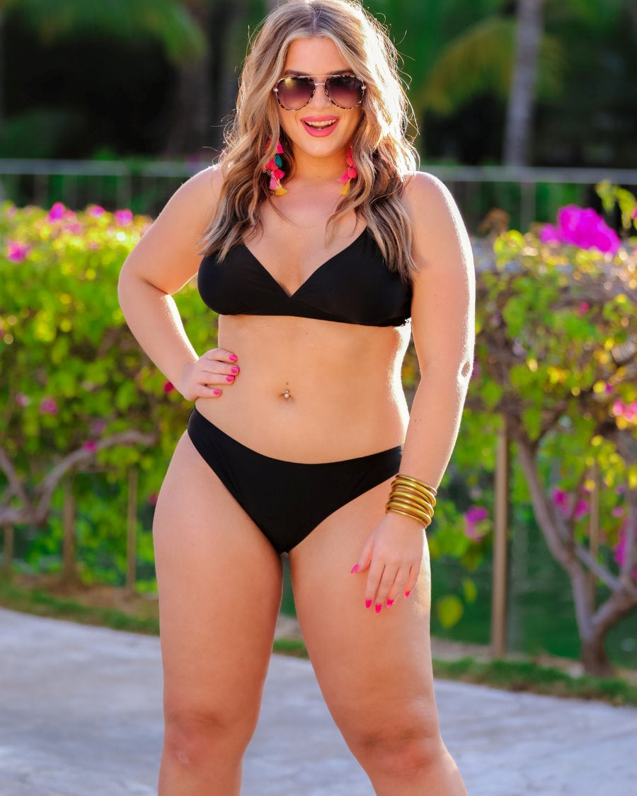 solid black two-piece triangle bikini with a back hook, removable padding, matching bottoms, and a sheer gold star pattern coverup