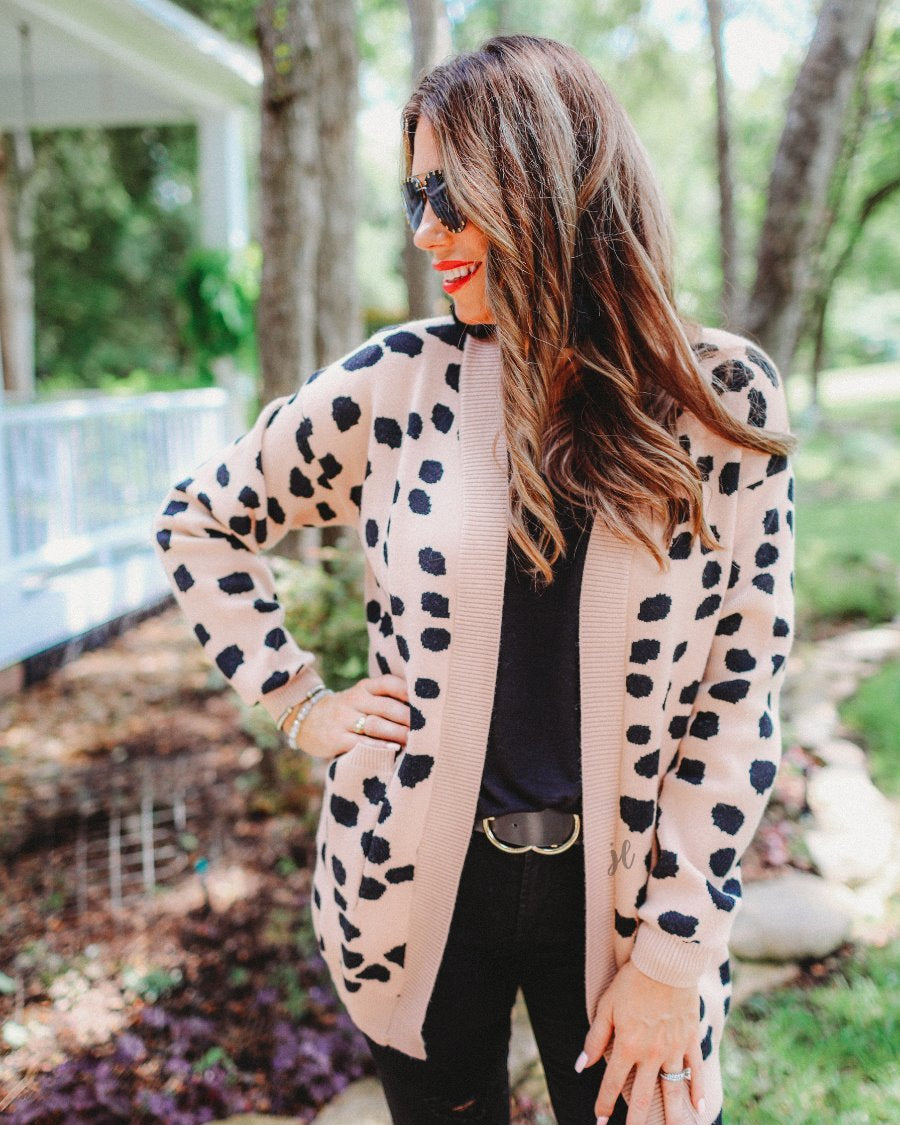 long-sleeve open front cardigan, finished in a black animal print on a neutral blush base