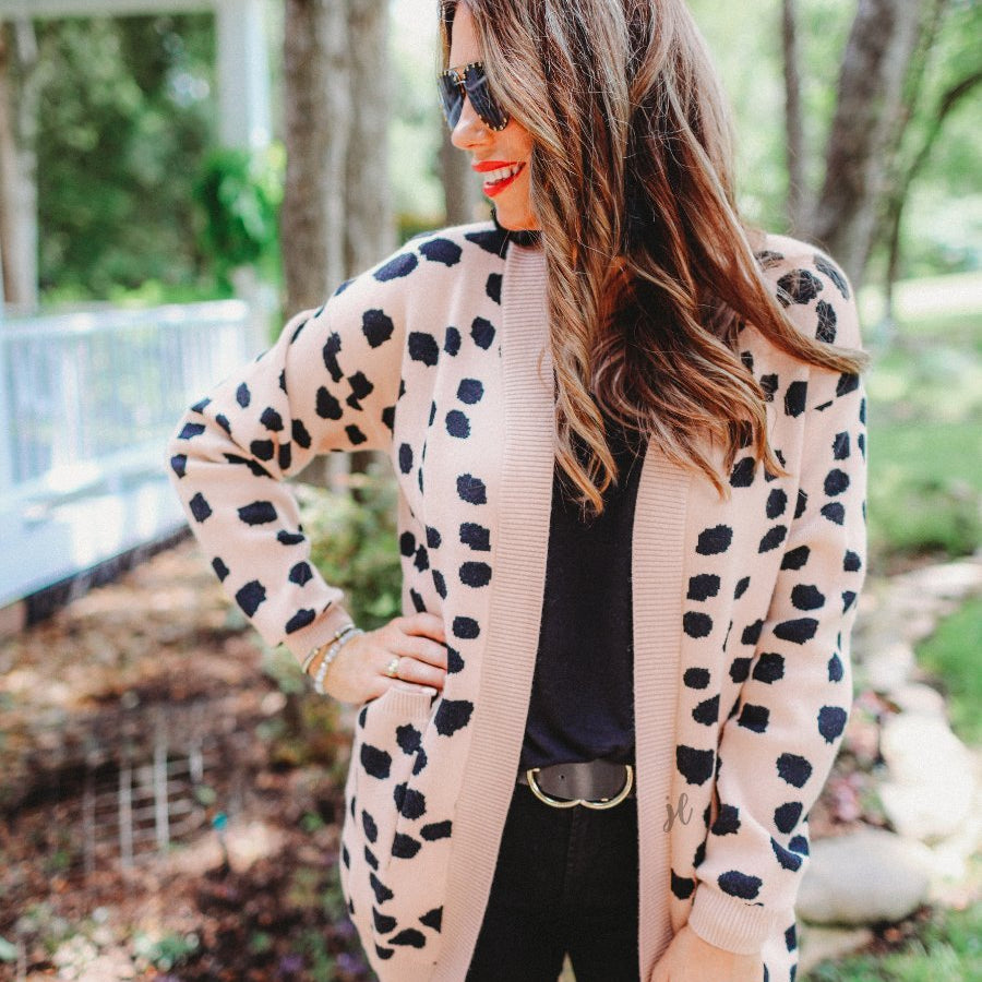 long-sleeve open front cardigan, finished in a black animal print on a neutral blush base