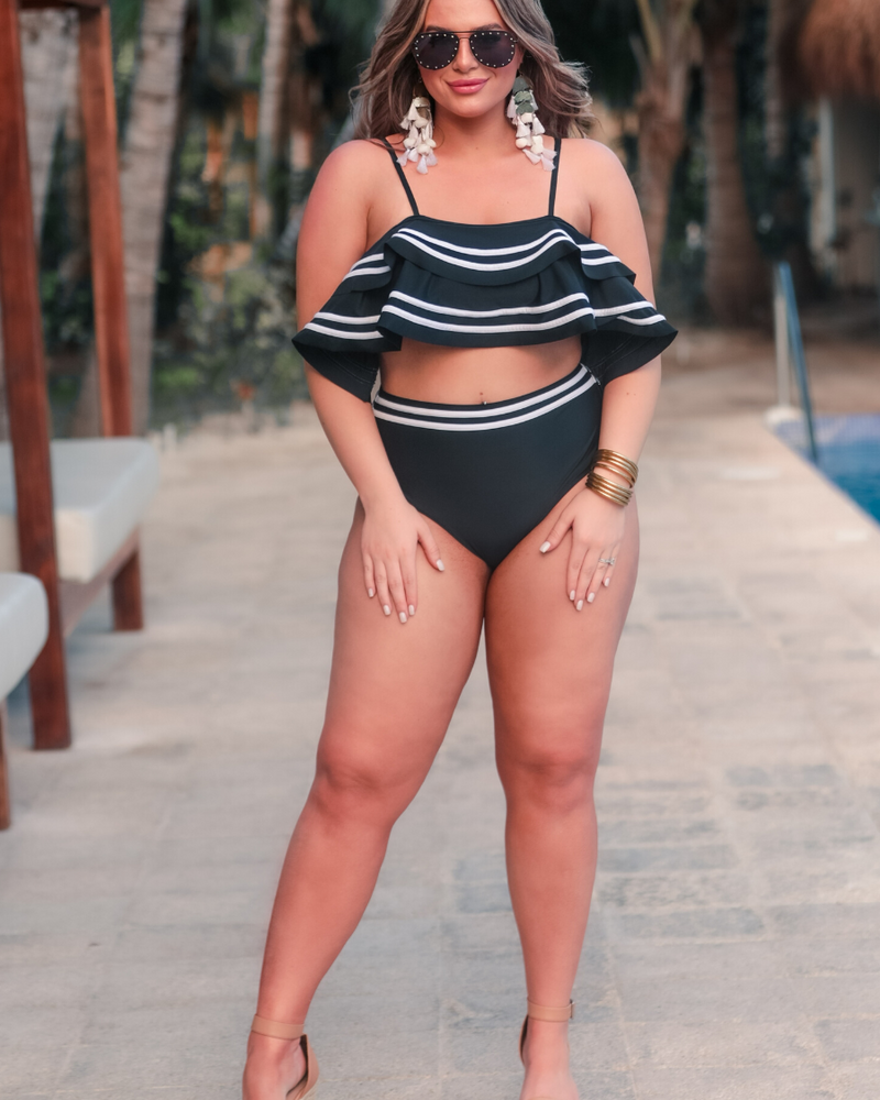 ruffled top with white piping and matching full-coverage high-waisted bottoms, removable padding, and removable/adjustable spaghetti straps