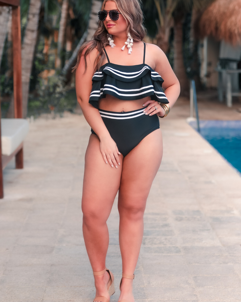 ruffled top with white piping and matching full-coverage high-waisted bottoms, removable padding, and removable/adjustable spaghetti straps