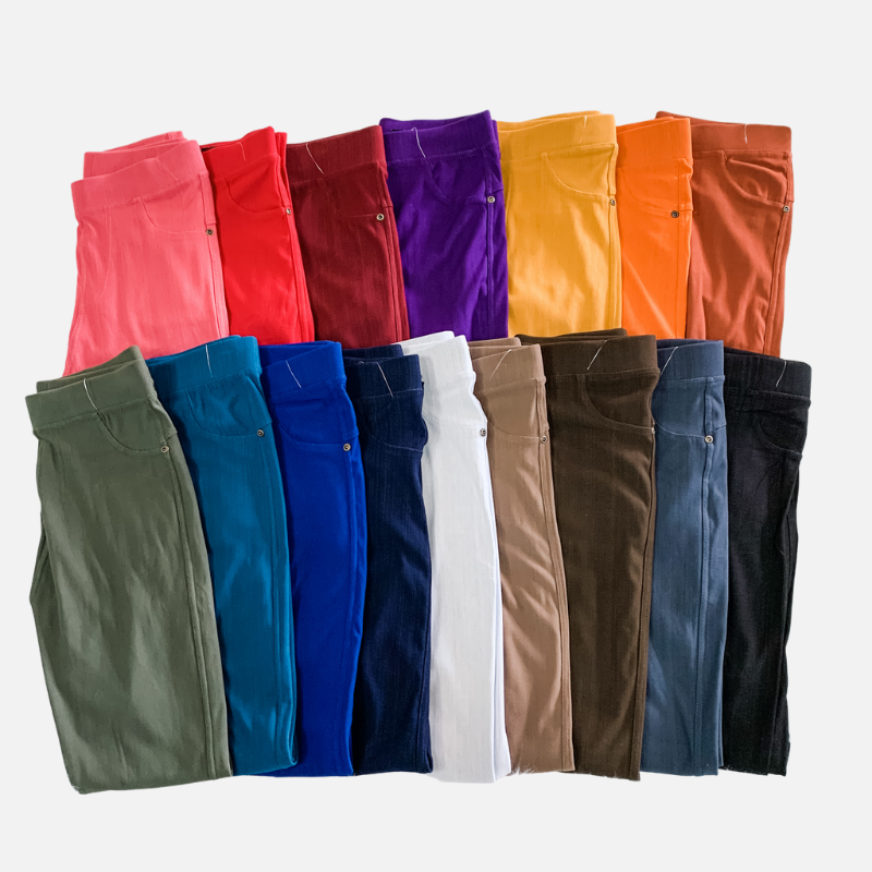 solid pull-on style leggings made of premium stretch fabric thicker than regular leggings, an elastic waistband, double back pockets, and a unique stripe detailing on the inside in coral, red, burgundy, purple, mustard, orange, rust, olive, teal, royal blue, navy, white, mocha, brown, charcoal, and black