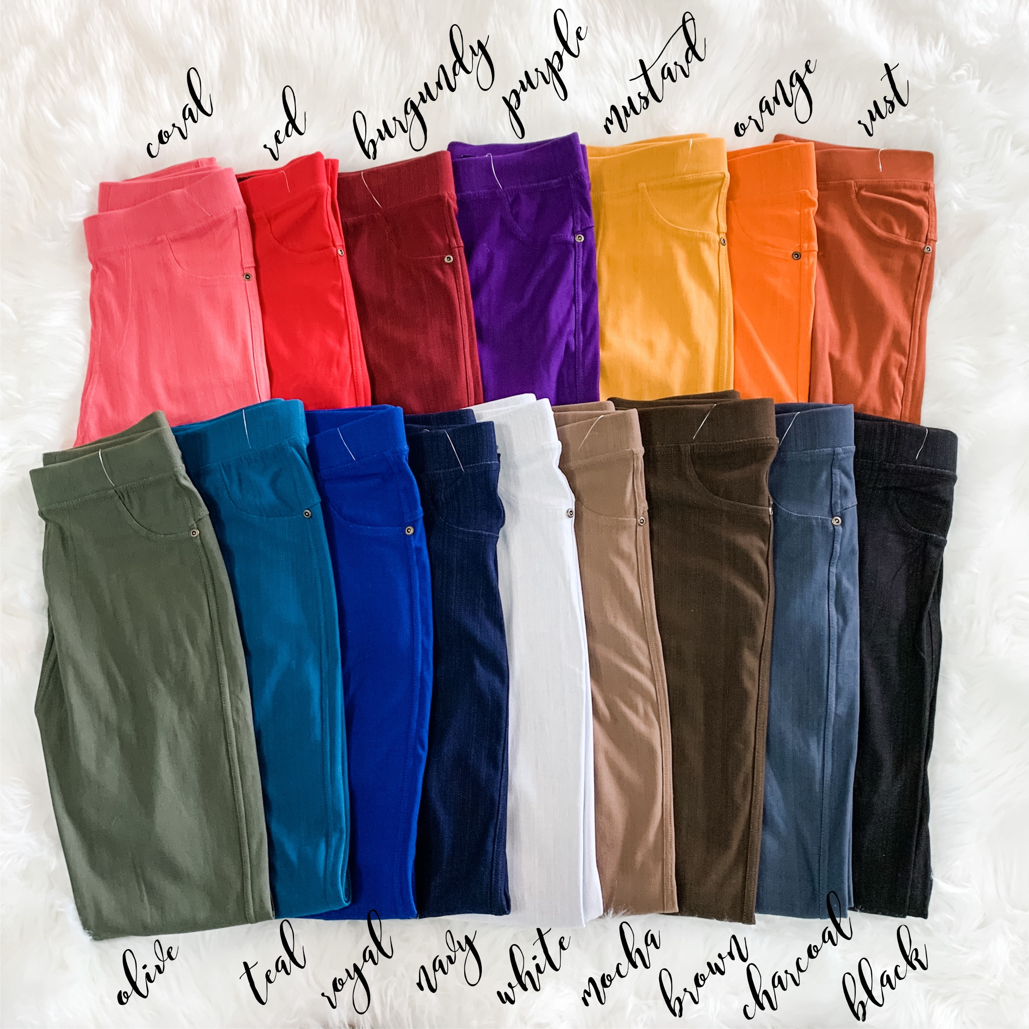 solid pull-on style leggings made of premium stretch fabric thicker than regular leggings, an elastic waistband, double back pockets, and a unique stripe detailing on the inside in coral, red, burgundy, purple, mustard, orange, rust, olive, teal, royal blue, navy, white, mocha, brown, charcoal, and black