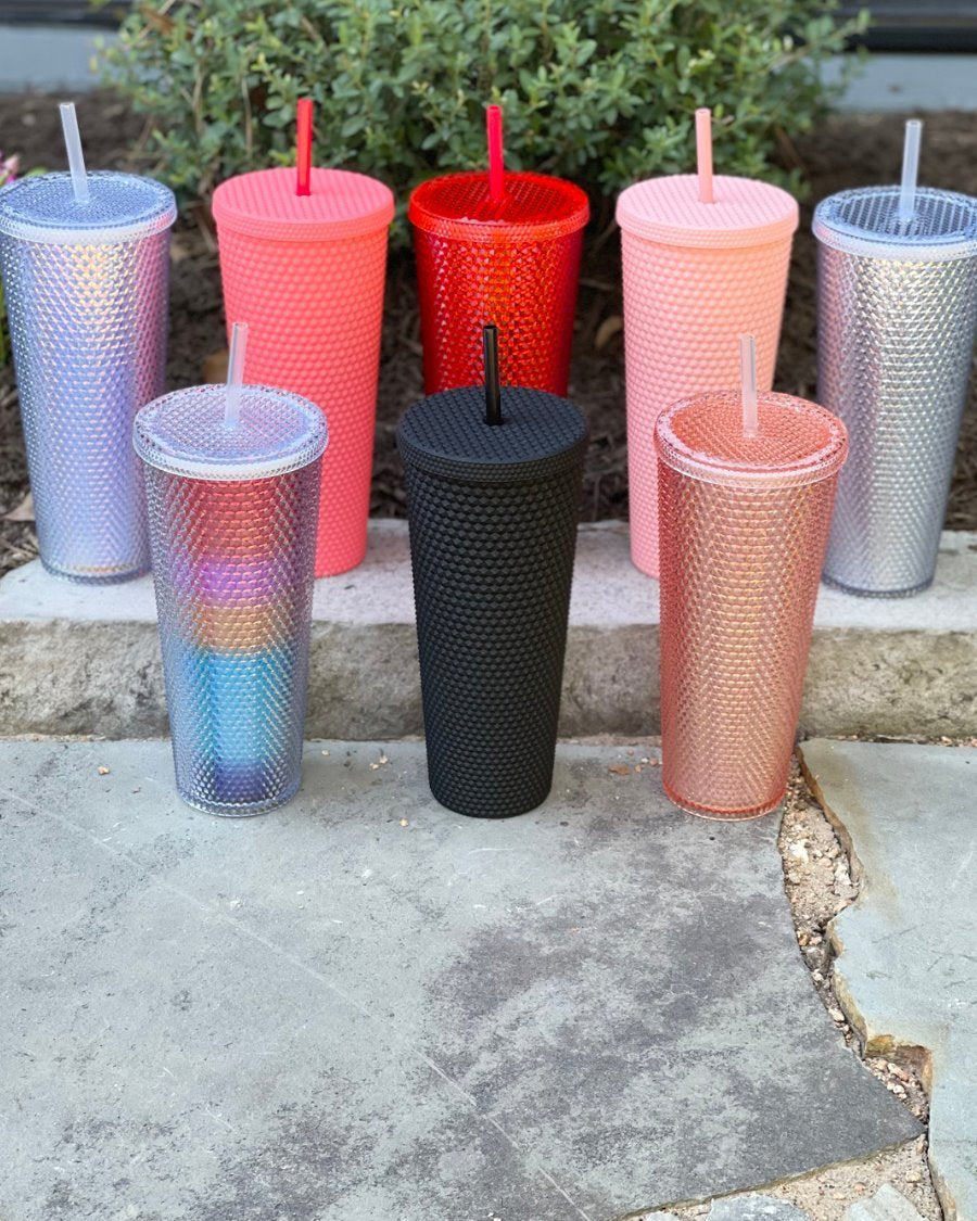 textured studded finish tumbler with matching reusable straw and screw on lid in black, hot pink, lavender, light pink, rainbow, red, and silver