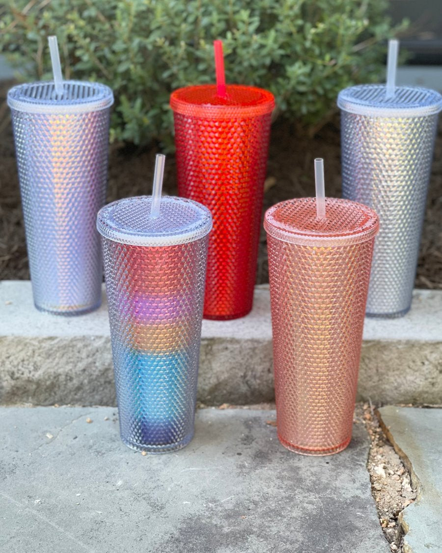 textured studded finish tumbler with matching reusable straw and screw on lid in lavender, rainbow, red, rose gold, and silver