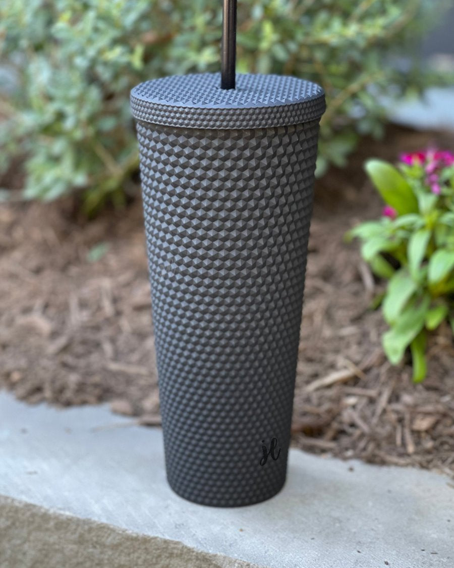 textured studded finish tumbler with matching reusable straw and screw on lid in black