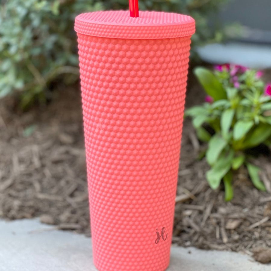 textured studded finish tumbler with matching reusable straw and screw on lid in hot pink