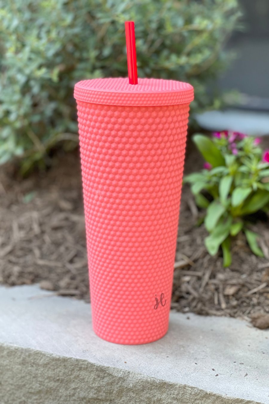 textured studded finish tumbler with matching reusable straw and screw on lid in hot pink