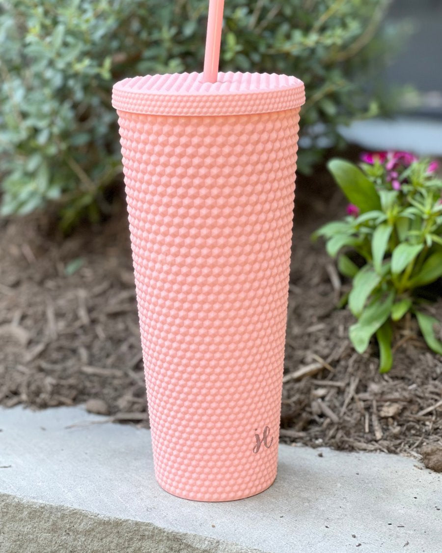 textured studded finish tumbler with matching reusable straw and screw on lid in light pink