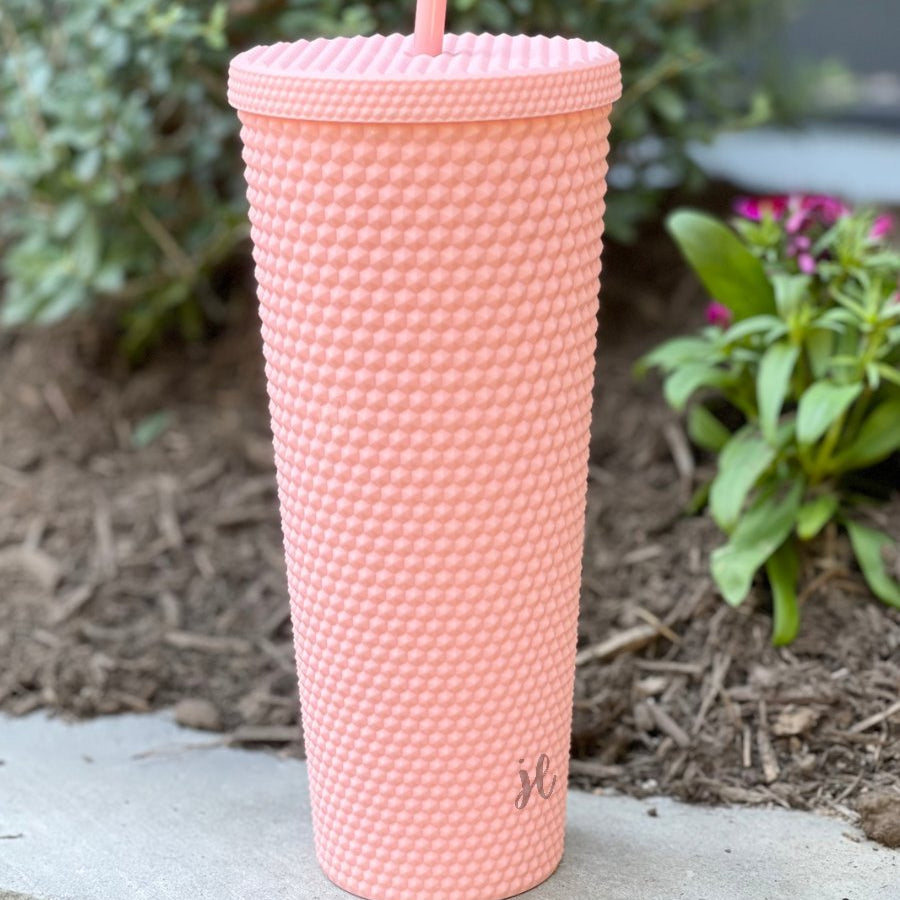 textured studded finish tumbler with matching reusable straw and screw on lid in light pink