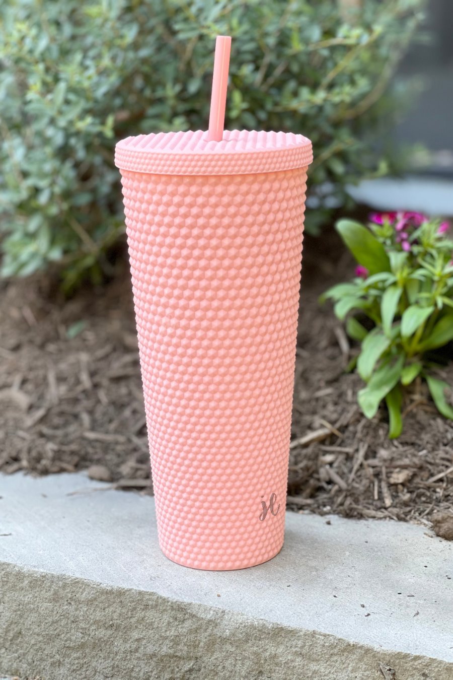 textured studded finish tumbler with matching reusable straw and screw on lid in light pink