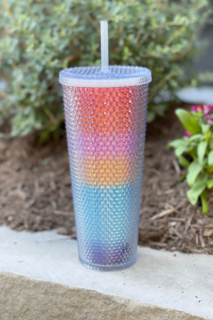 textured studded finish tumbler with matching reusable straw and screw on lid in rainbow