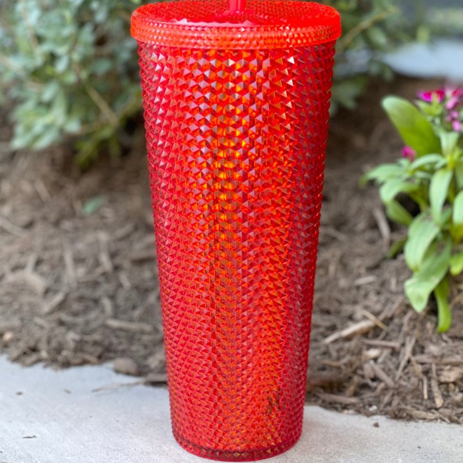 textured studded finish tumbler with matching reusable straw and screw on lid in red