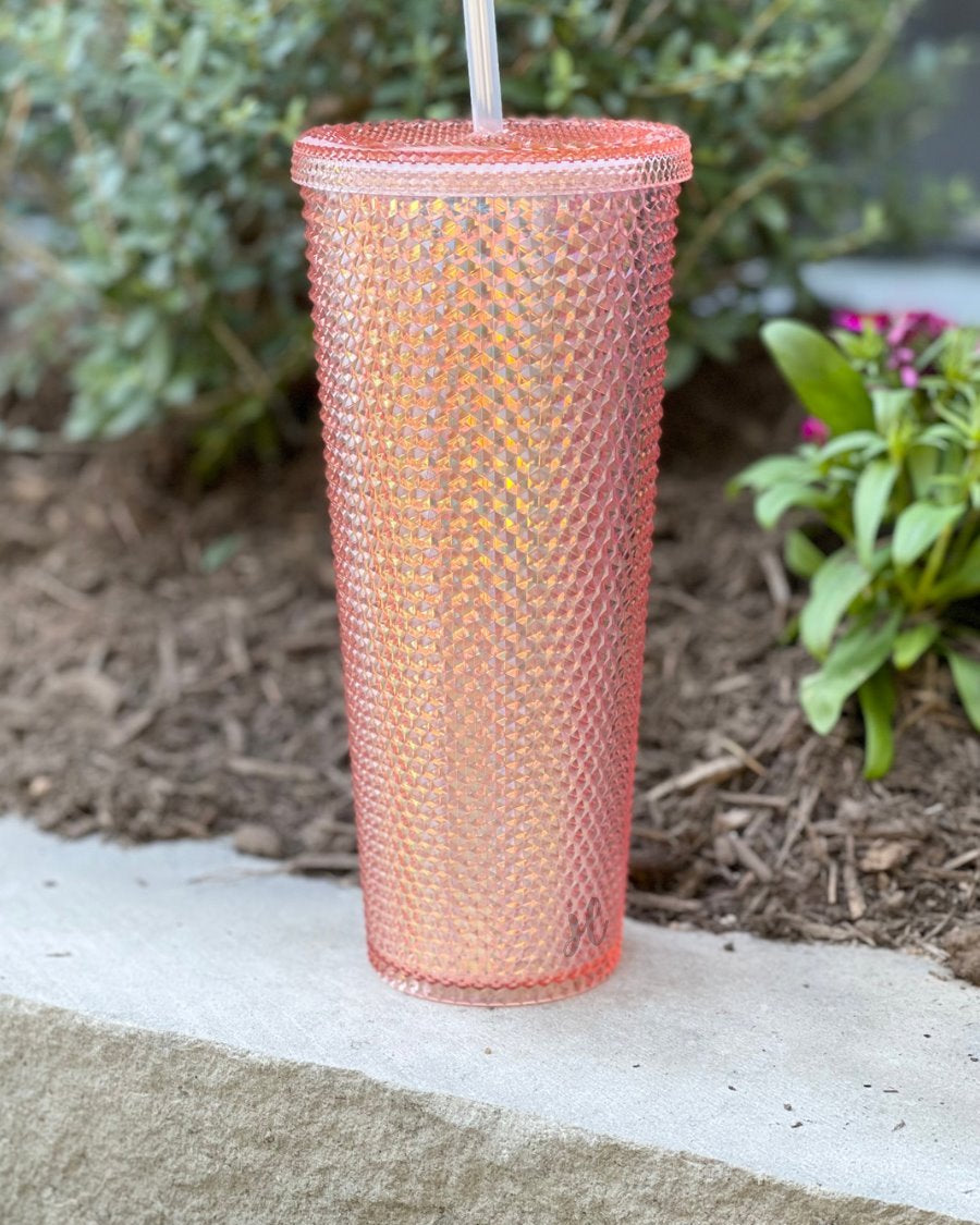 textured studded finish tumbler with matching reusable straw and screw on lid in rose gold