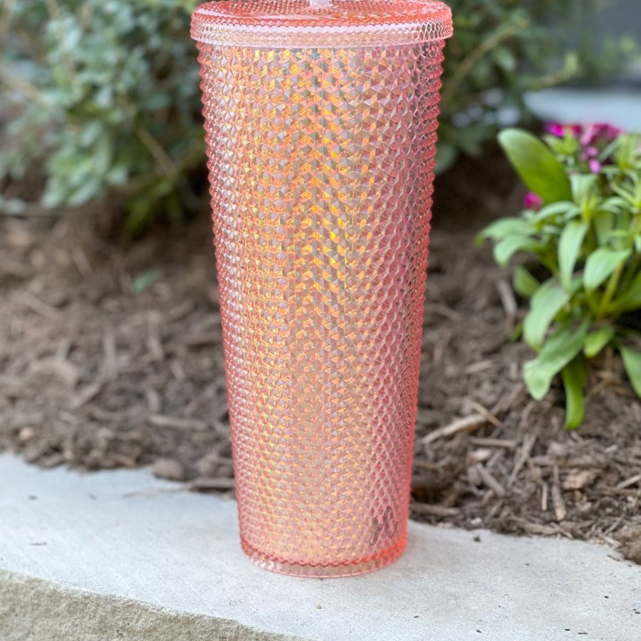 textured studded finish tumbler with matching reusable straw and screw on lid in rose gold