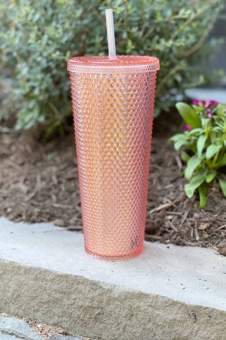textured studded finish tumbler with matching reusable straw and screw on lid in rose gold
