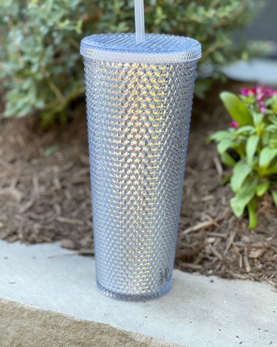 textured studded finish tumbler with matching reusable straw and screw on lid in silver