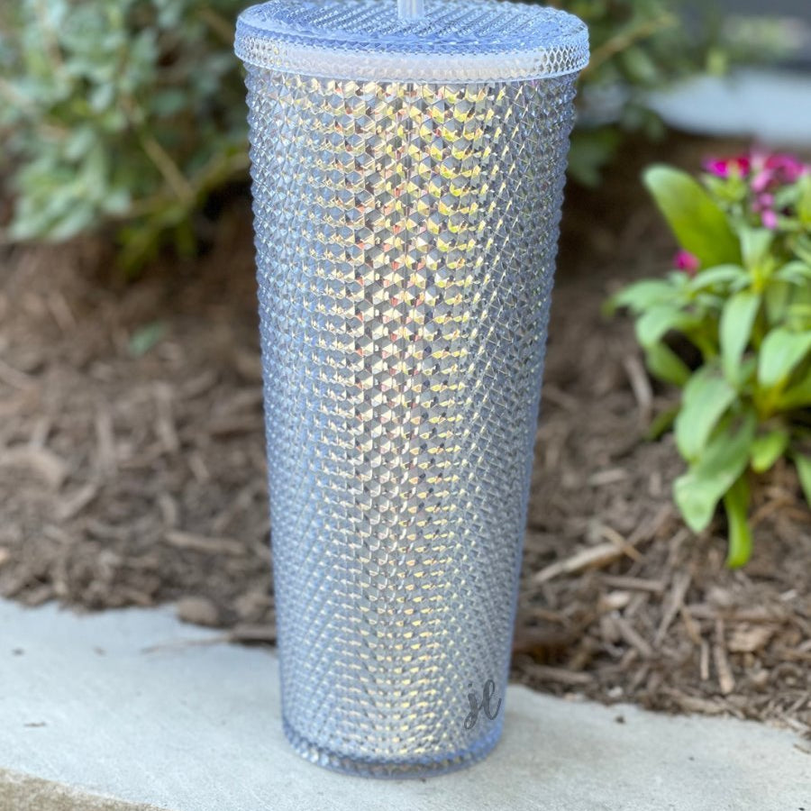 textured studded finish tumbler with matching reusable straw and screw on lid in silver