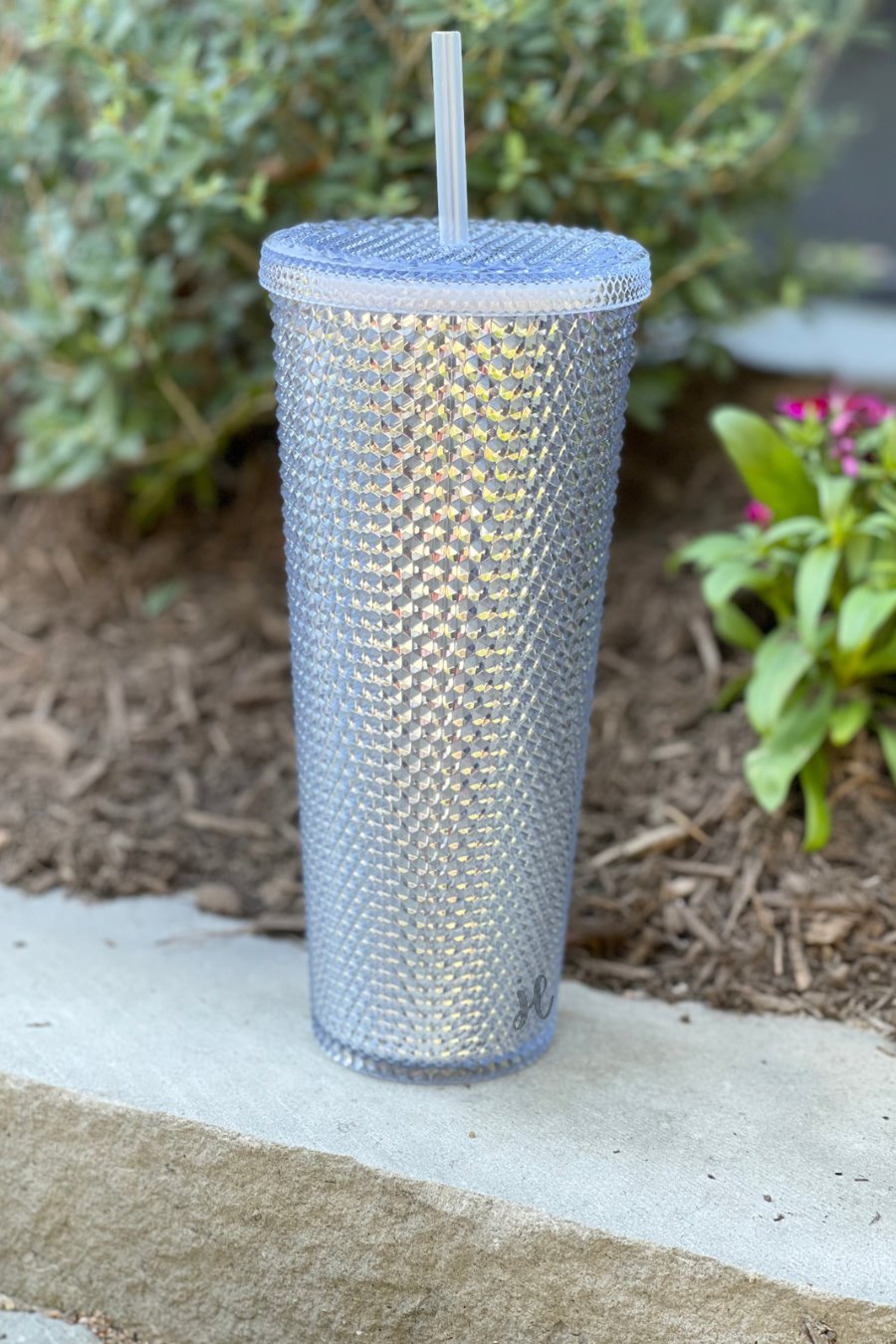 textured studded finish tumbler with matching reusable straw and screw on lid in silver