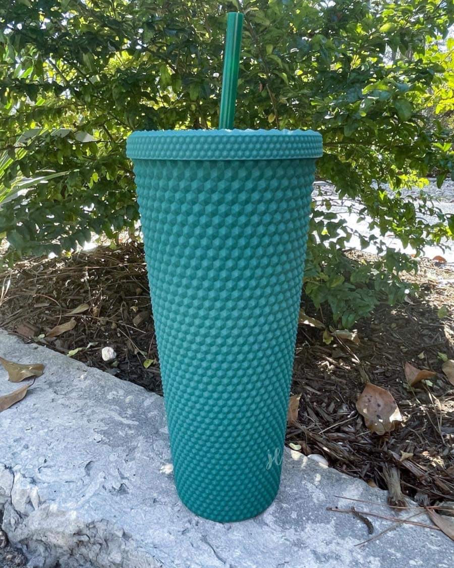 textured studded finish tumbler with matching reusable straw and screw on lid in teal