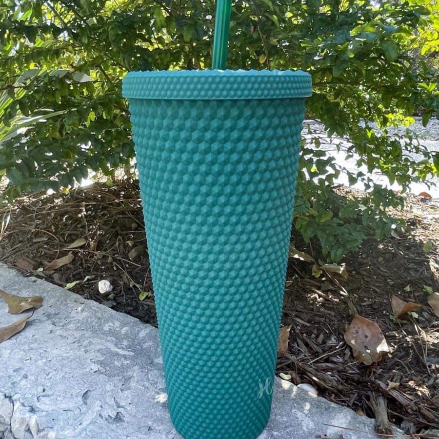 textured studded finish tumbler with matching reusable straw and screw on lid in teal