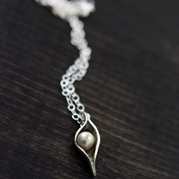 one pea in a pod made of fine pewter with freshwater pearls on an 18" plated link chain necklace available in one pod
