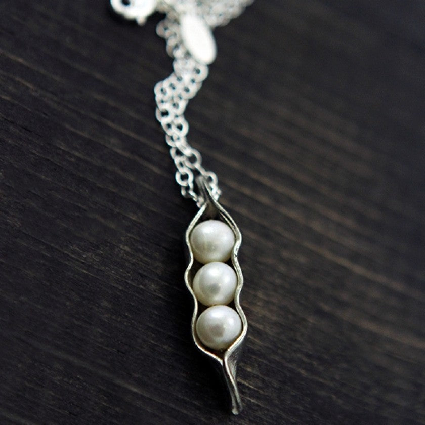 three peas in a pod made of fine pewter with freshwater pearls on an 18" plated link chain necklace