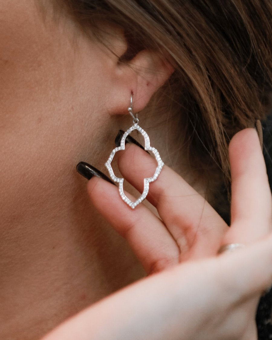 gold plated quatrefoil-shaped rhinestone hook earrings