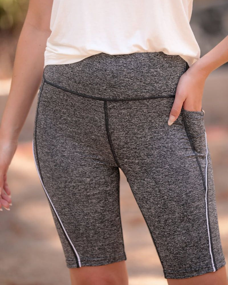 sleek lightweight biker shorts with a high elastic waistband for tummy control, side pockets, and a flattering figure-hugging short silhouette