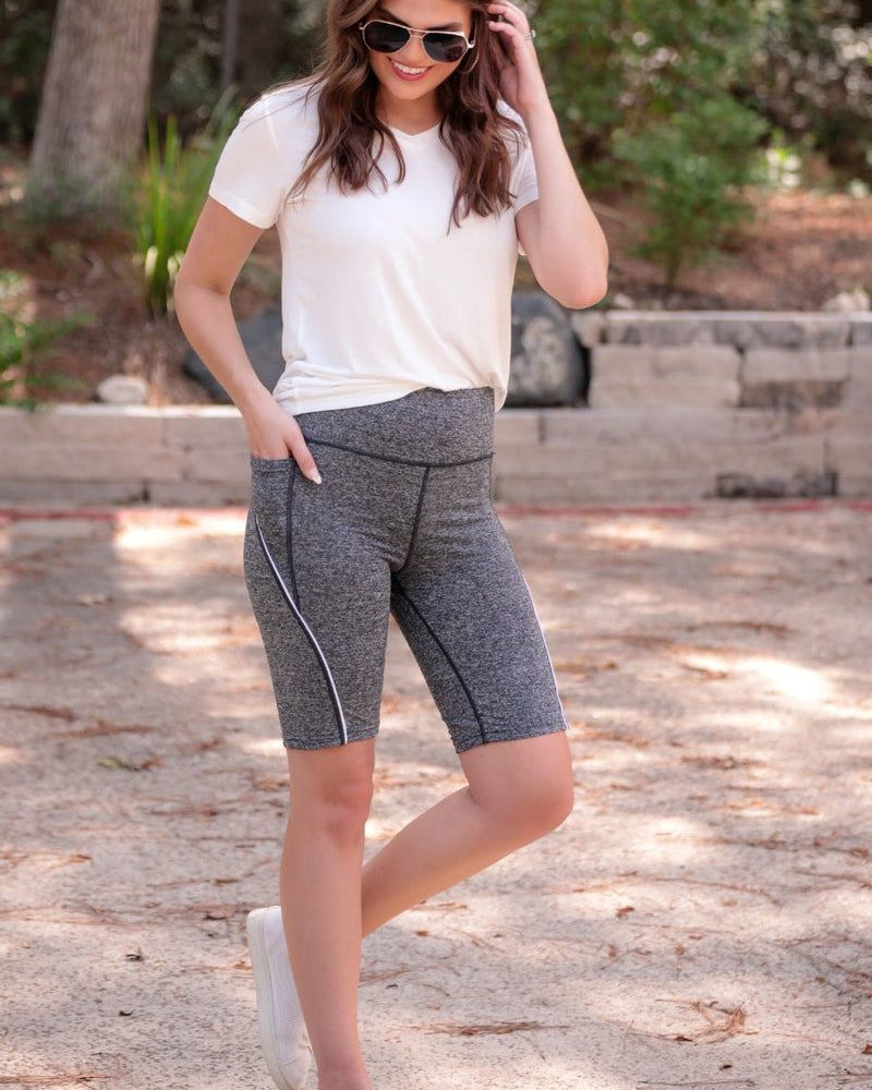 sleek lightweight biker shorts with a high elastic waistband for tummy control, side pockets, and a flattering figure-hugging short silhouette