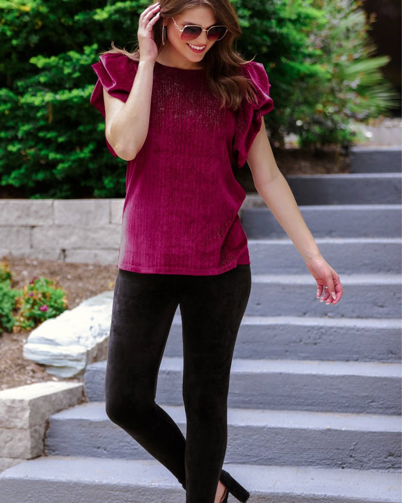 ultra soft stretch leggings crafted from luxurious velvet fabric with an elastic waistband and flattering rise in black