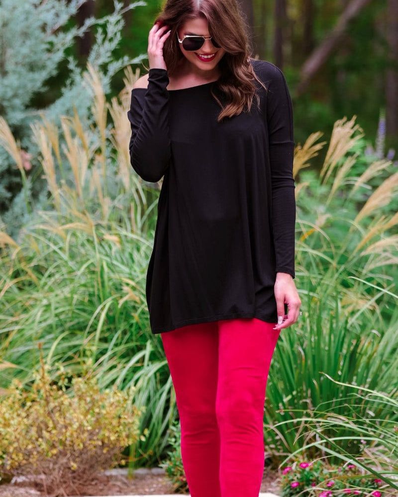 ultra soft stretch leggings crafted from luxurious velvet fabric with an elastic waistband and flattering rise in red