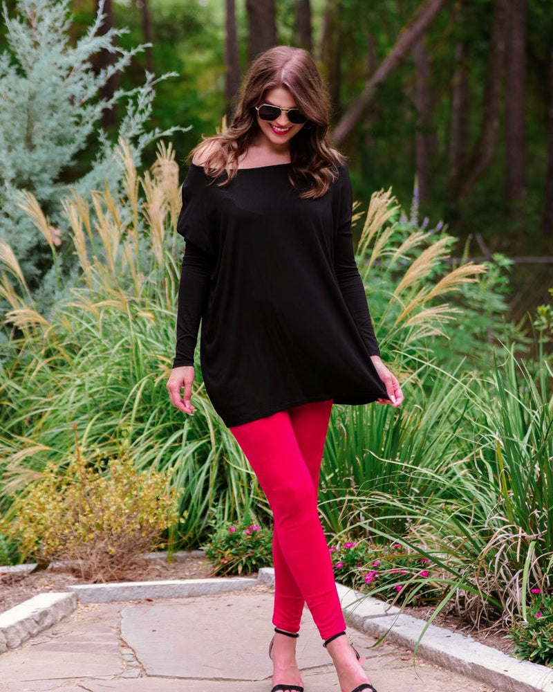 ultra soft stretch leggings crafted from luxurious velvet fabric with an elastic waistband and flattering rise in red