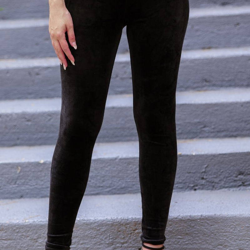 ultra soft stretch leggings crafted from luxurious velvet fabric with an elastic waistband and flattering rise in black