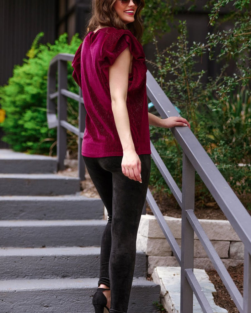 ultra soft stretch leggings crafted from luxurious velvet fabric with an elastic waistband and flattering rise in black