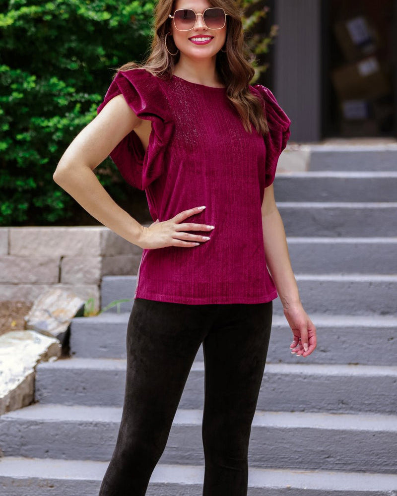 ultra soft stretch leggings crafted from luxurious velvet fabric with an elastic waistband and flattering rise in black