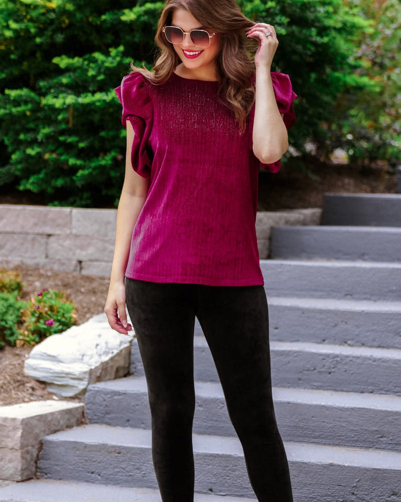 ultra soft stretch leggings crafted from luxurious velvet fabric with an elastic waistband and flattering rise in black