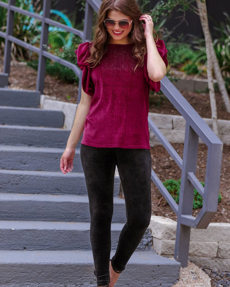 ultra soft stretch leggings crafted from luxurious velvet fabric with an elastic waistband and flattering rise in black