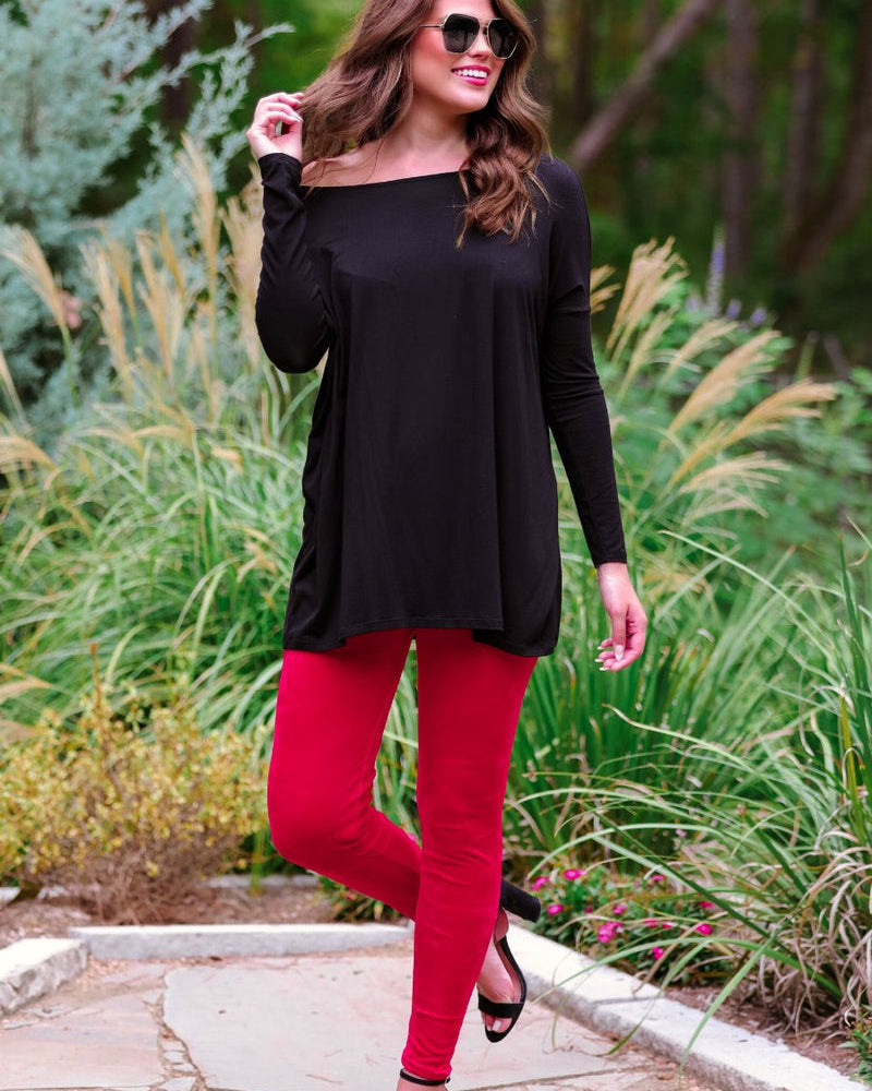 ultra soft stretch leggings crafted from luxurious velvet fabric with an elastic waistband and flattering rise in red