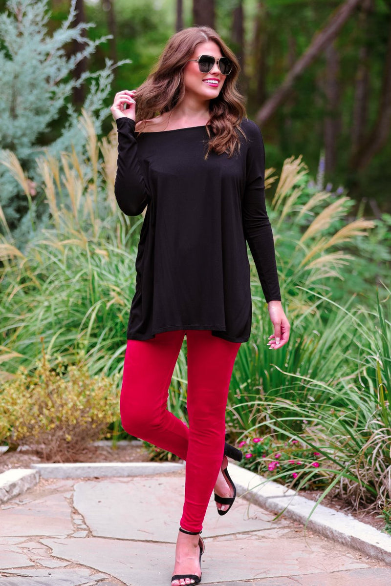 ultra soft stretch leggings crafted from luxurious velvet fabric with an elastic waistband and flattering rise in red