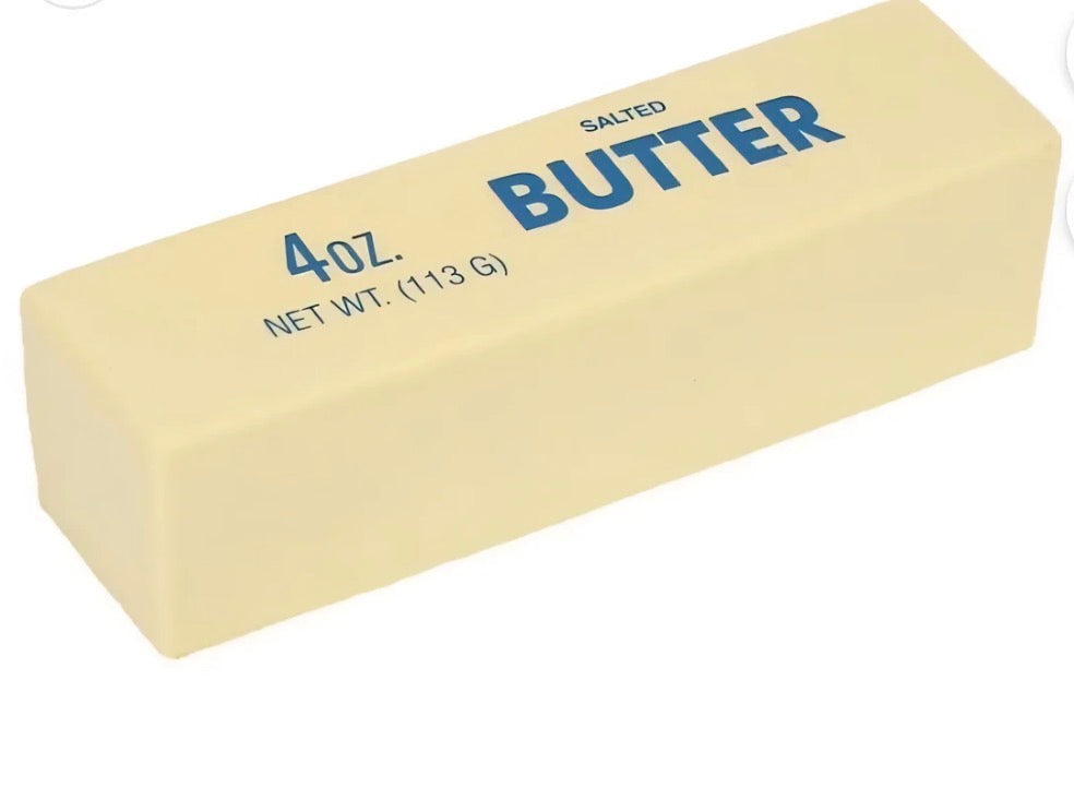 Block of butter with '4oz' and '113g' text on a white background
