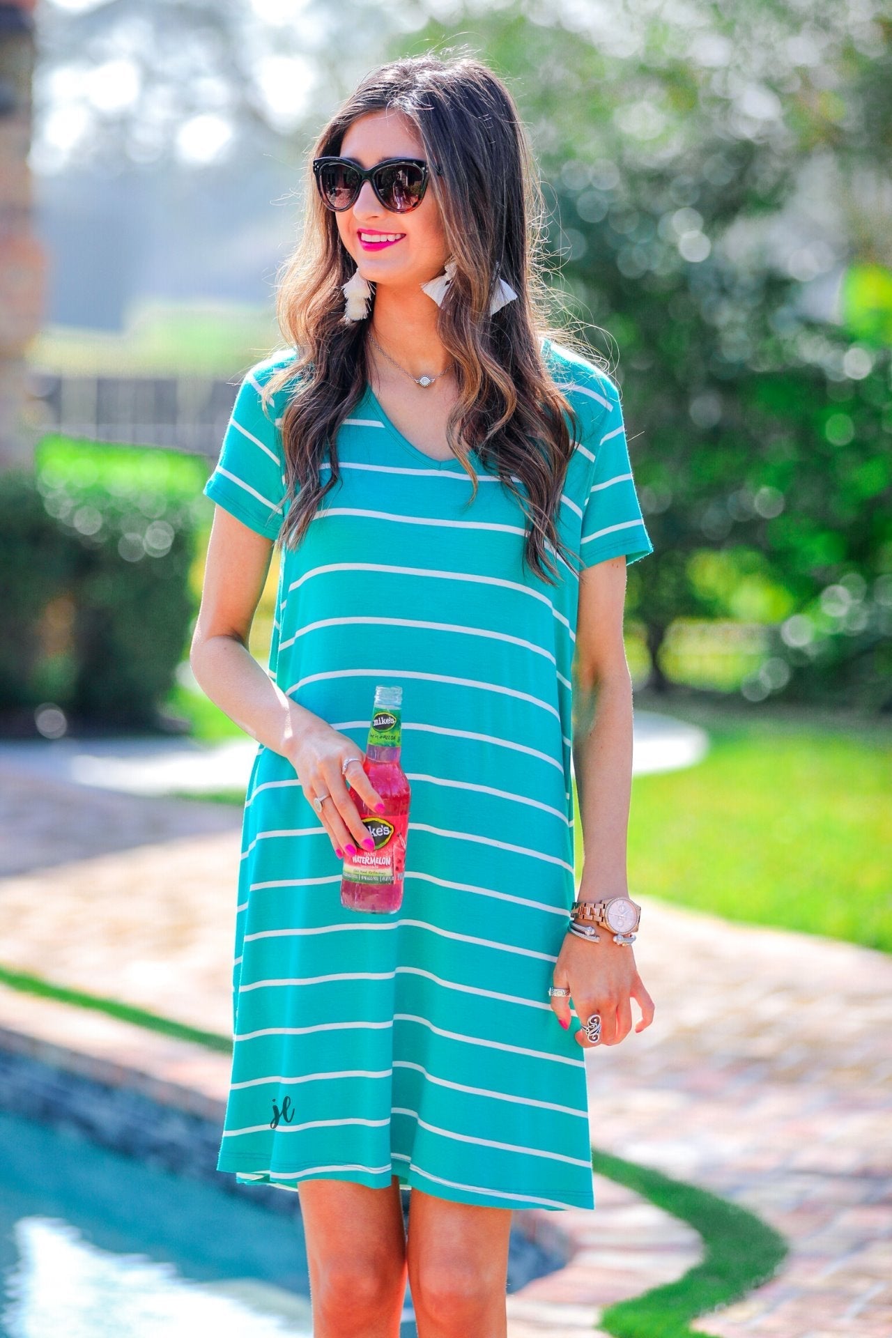 short-sleeve A-line dress with a V-neckline, crafted from ultra-soft fabric in a solid color with horizontal white stripes and a straight hemline in mint